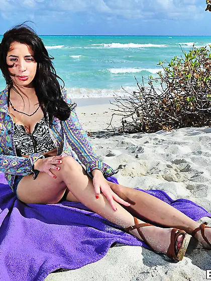 Lovely babe having dark hair is masturbating passionately and ge