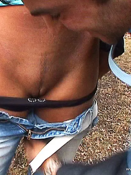 Misty Mild kneels before her handsome lover and sucks his throbb