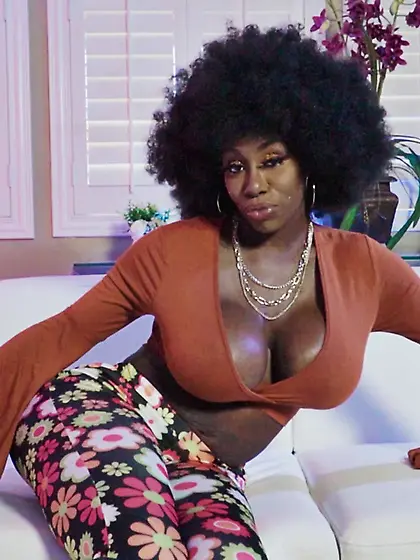 Curly-haired ebony with big boobs and ass pleasures her man on t