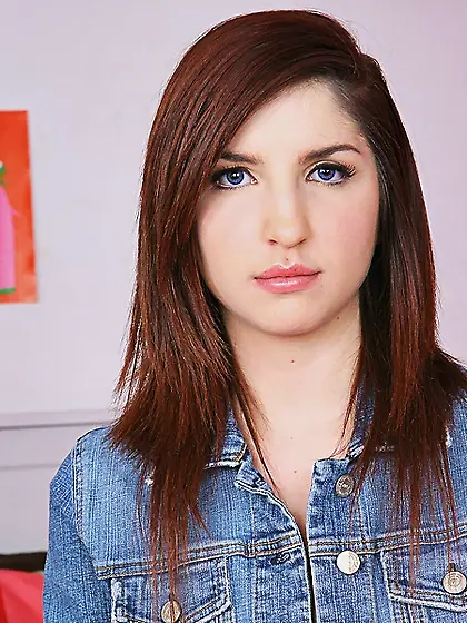 Alluring redhead teen gal Lexi Brooks strips on her bed and suck