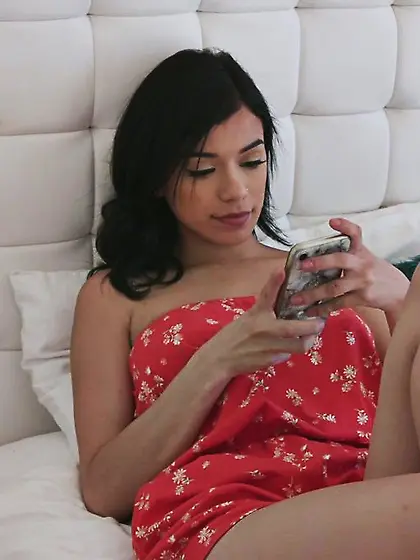 Slim brunette plays pussy