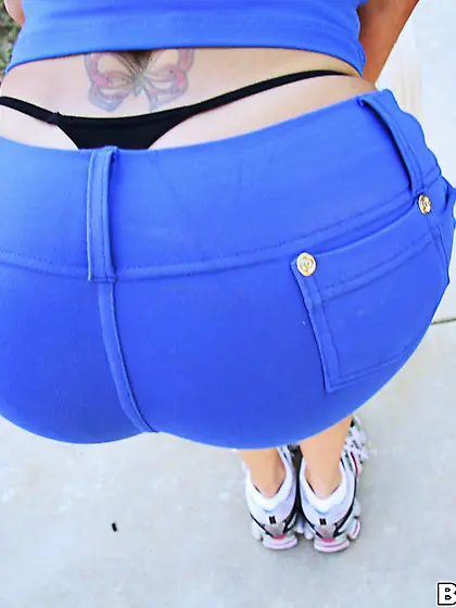 Brandi Love strips her sexy blue shorts off and shows her hot as