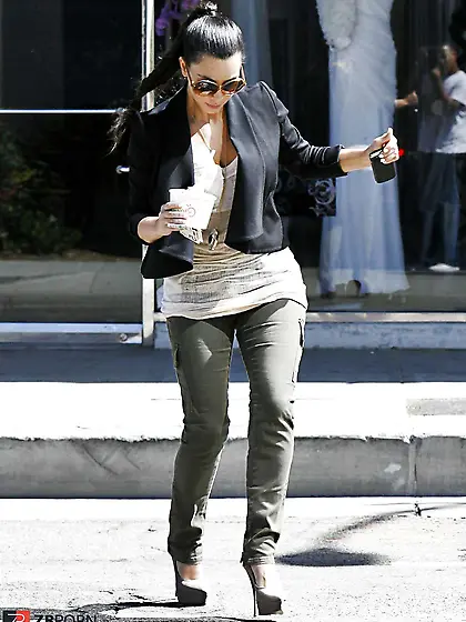 Kim Kardashian cleavy in ebony headed to Katsuya Restaurant