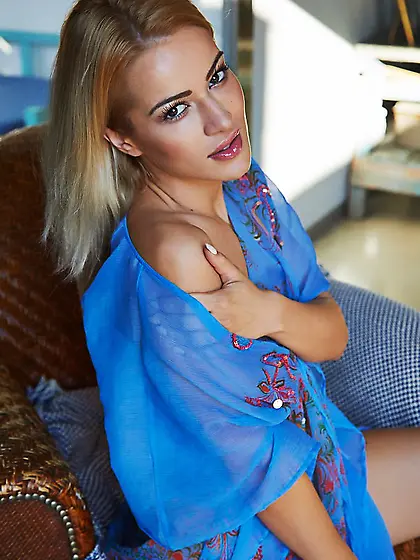 Angelic blonde with natural breasts showcasing her beauty on cam