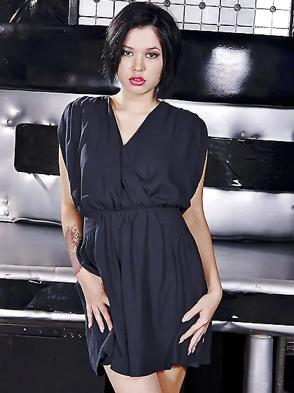 Sensual brunette gets rid of the dress and underwear remaining i