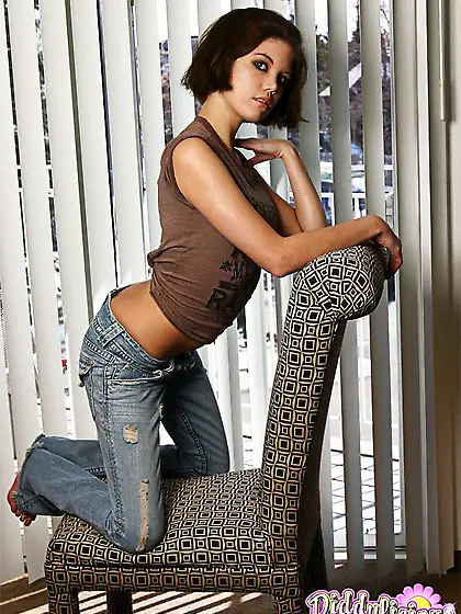 Cute teen gal Diddylicious takes off her tight jeans and shows h