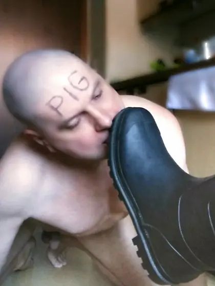 sniffing and licking dirty boot soles