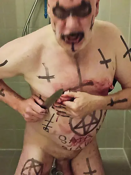 Satan Slave Cuts Open His Own Nipples
