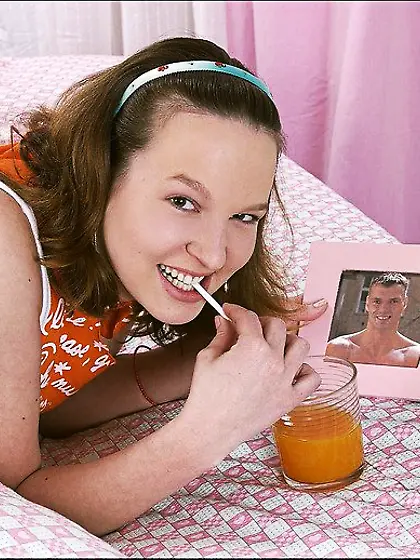 Frisky teen girl Joann has a strong tanned guy probing her mouth