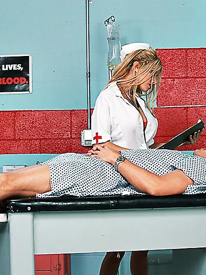 Sexy Nurse Gina Lynn will see you now.  Is there anything she can