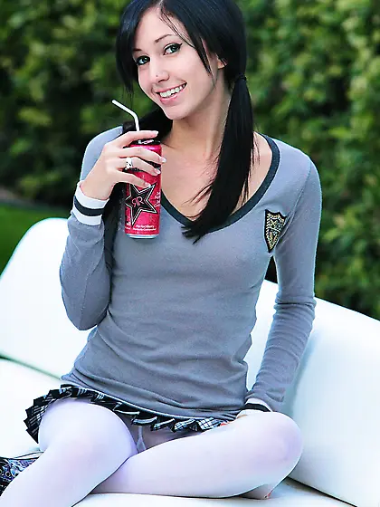 After lessons young brunette takes off pantyhose showing her swe