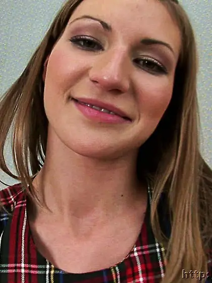 Teen blonde poses showing shaved pussy