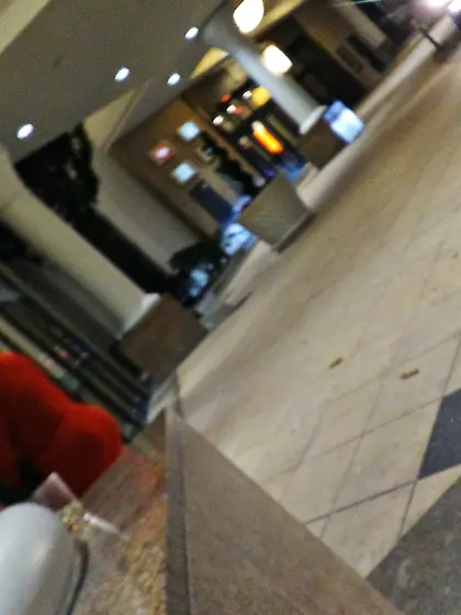 Red dress juicy GILF with phat ass at the casino.