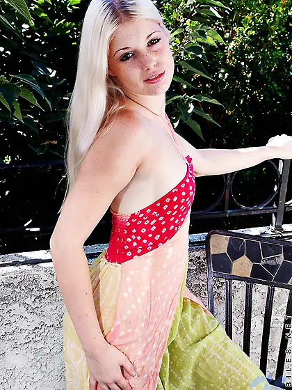 Charlotte Stokely takes her sexy red lingerie for the camera and