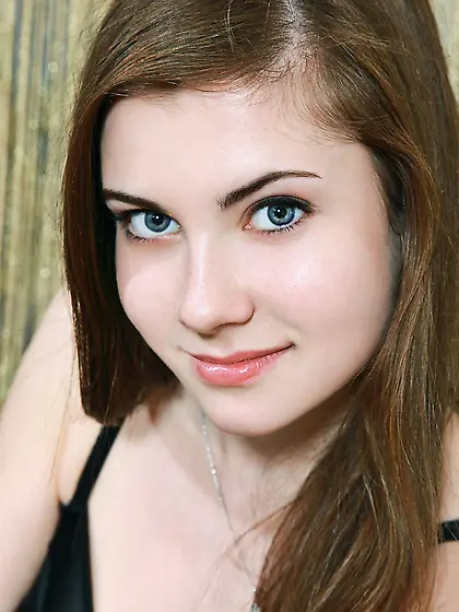 Sweet teen proudly demonstrates her big natural tits and perfect