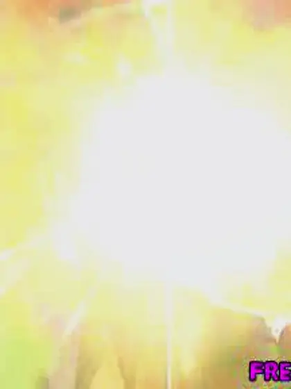 Braided pigtails hang smiles