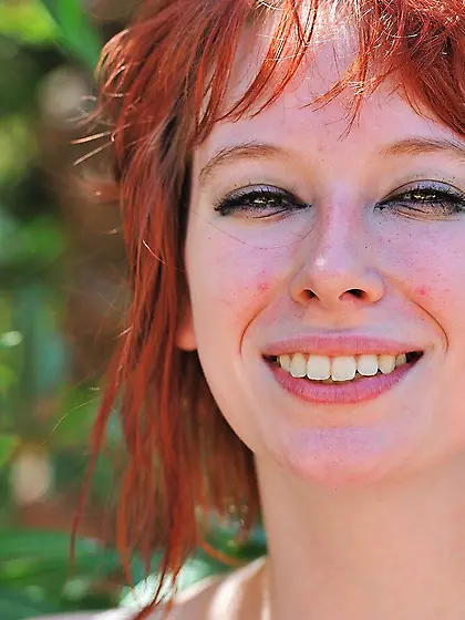 Playful and nerdy redheaded teen shows her hot body in public