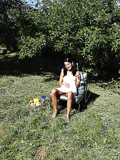 Charming brunette gal Lexie Dona is in the open air filling puss