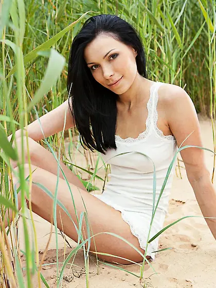 Naked brunette bimbo Lily Nubiles erotically crawling on the war