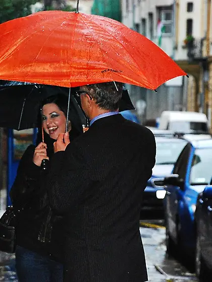 Black-haired sexpot poses on camera before welcoming old man wit