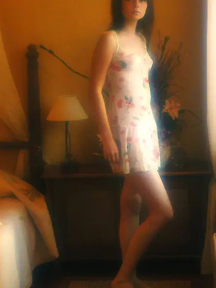 Solo posing gallery focusing on a baby-faced brunette bombshell