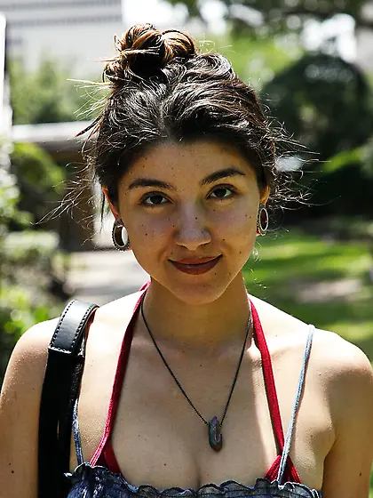 Natural chick poses for you in a red bikini