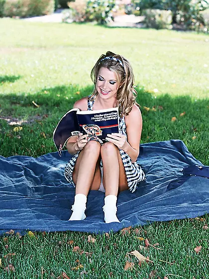 Busty blonde babe Sydney Moon strips her clothes and shows her t