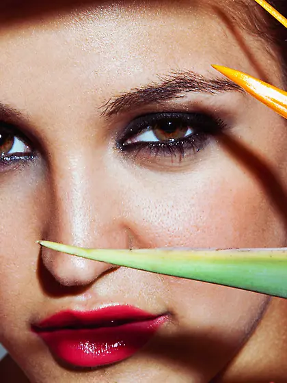 Sweet short haired chick posing among the...