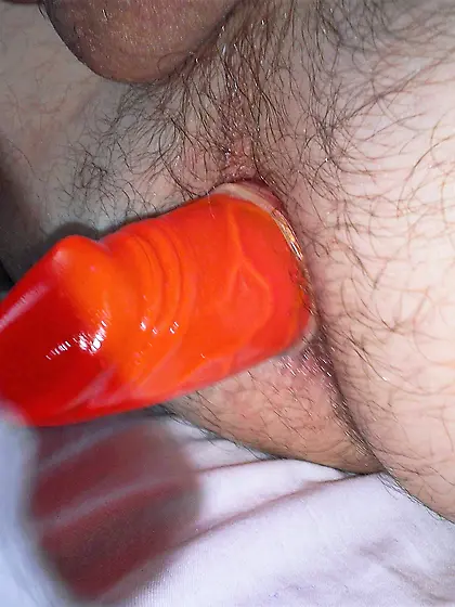 My first red dildo in my ass