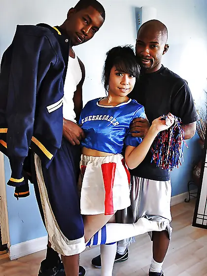 Asian cheerleader May Lee has threesome with black players from