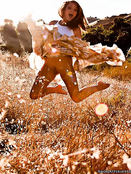 The frisky brunette Charlie Laine slowly stripping and playing n