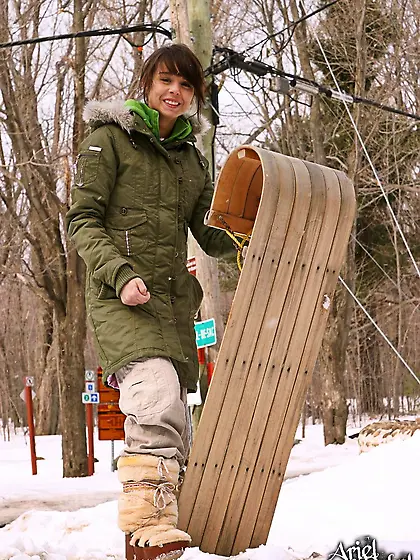 Ariel Rebel sleighs, wallows in snow and even performs a stripte