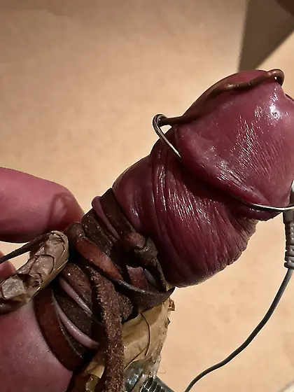 Estim,  foreskin stretched back,  glans cbt