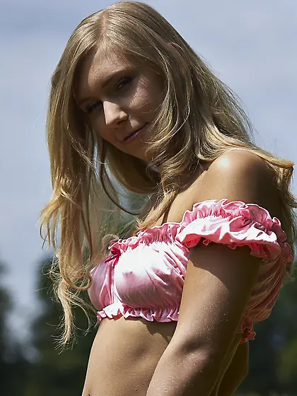 Young blonde feels unity with nature while walking naked in the