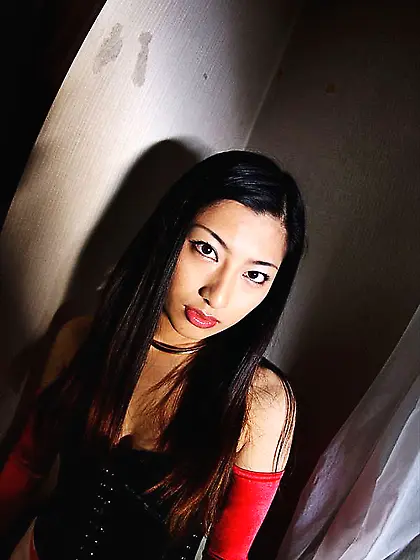 Passionate Ran Asakawa in black and red outfit is flashing the c