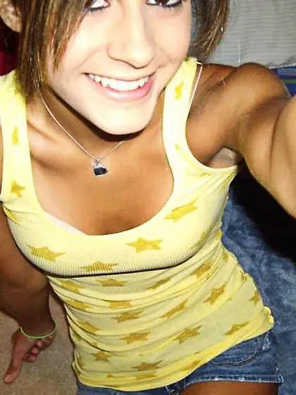 Yellow top short-haired brunette