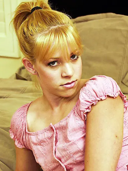 Foxy teen cuttie Leah Luv strips her pink shirt on the bed and s