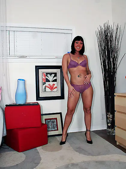 Julie Night strips her purple lingerie for the camera and finger