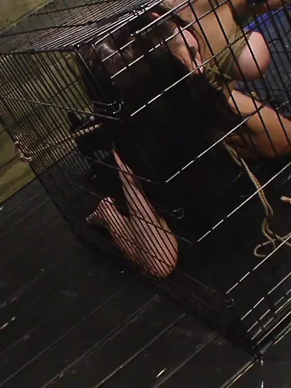 Caged asian female slave
