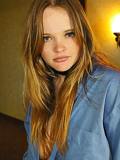 Smiling busty teen kissy