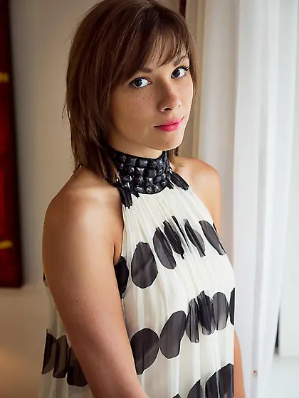 Shaved little beauty Karin P gropes her dainty tits and spreads