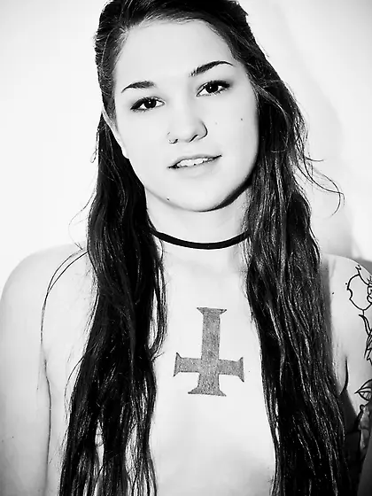 Girl with tattoos believes that she has a hot body and it's hard