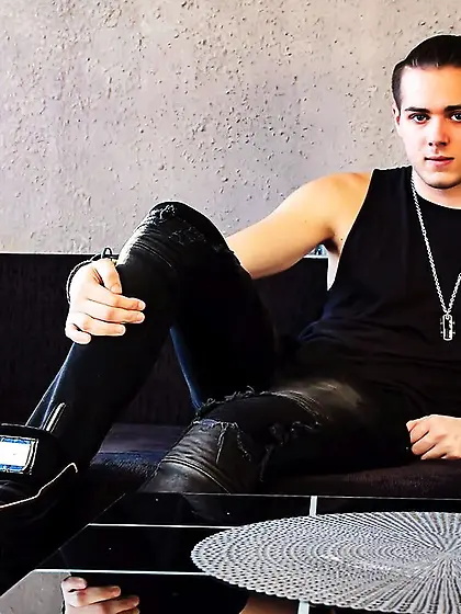 Young man klausadam striptease