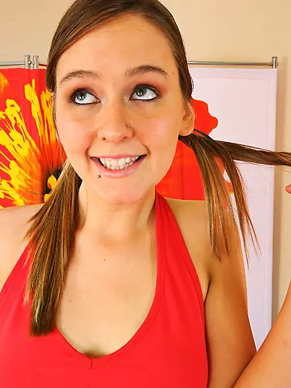 Two-tailed brunette takes gets rid of her lacy red lingerie and