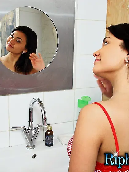 Brunette chick washing face