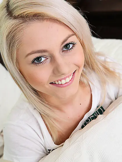 Cute teen hottie Pinky June takes off her pajamas on the bed and