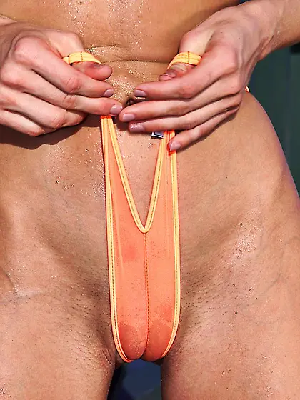 Frisky milf Holly Samson doing bikini cameltoe and filling pussy