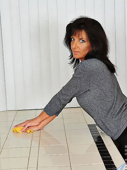 Brunette milf Sarah Bricks stripping,  playing with pantyhose and