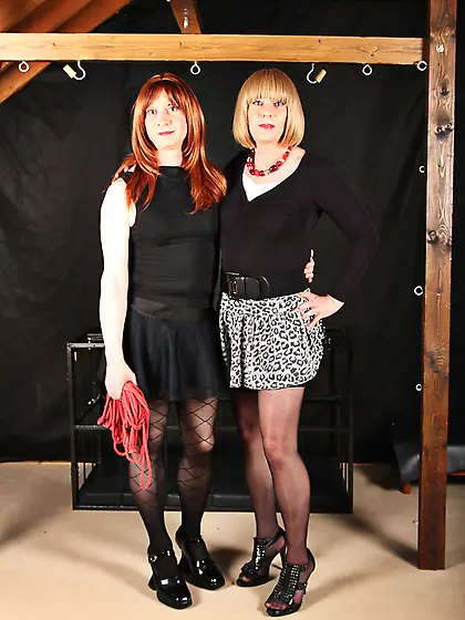 Redhead TS spanking her GF