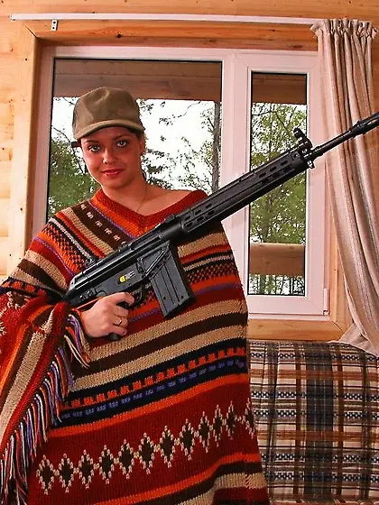 Hot girl with weapon
